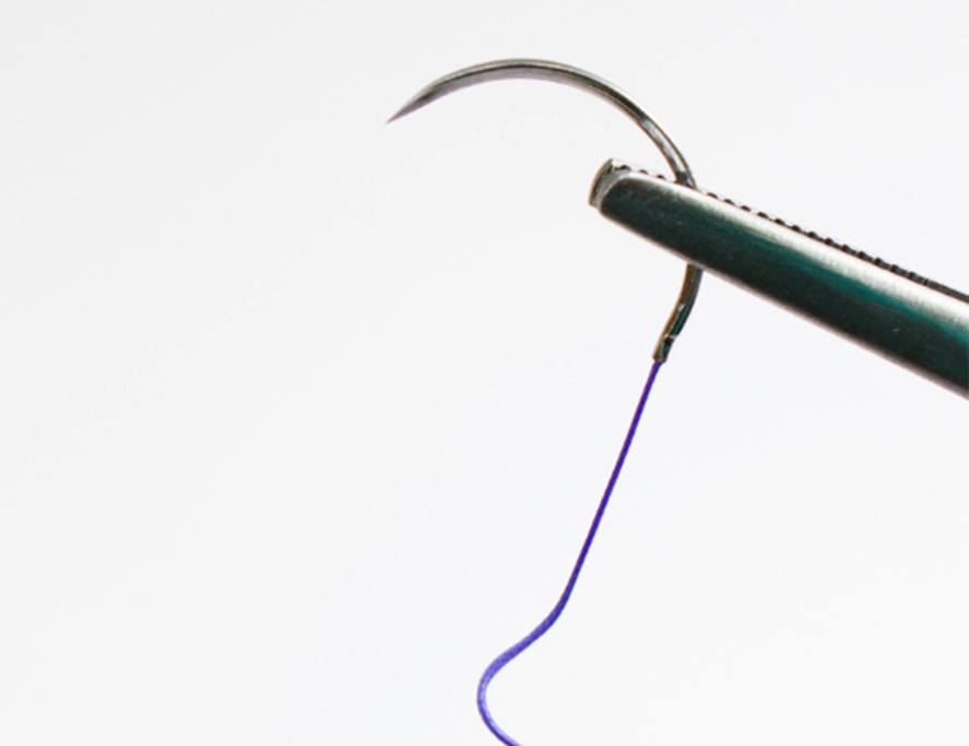 Absorbable suture on needle